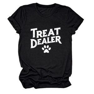 Close-up of the cotton fabric texture and bold Treat Dealer print on a black T-shirt