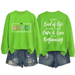 Fluorescent green sweatshirt showing hospice nurse leopard print and back quote text detail
