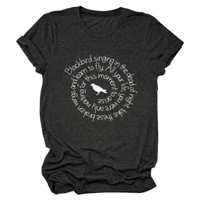 Detail of dark gray heather T-shirt showing round neck and white bird graphic print