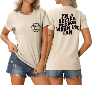 Détail avant et arrière du t-shirt crème avec le slogan I'M A BETTER PERSON TAN