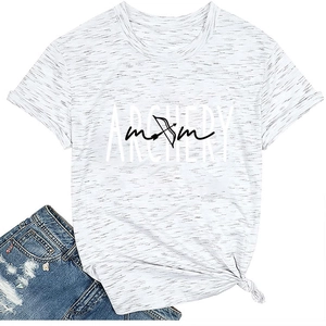 Flat lay of gray Archery Mom T-shirt with arrow graphic paired with denim shorts