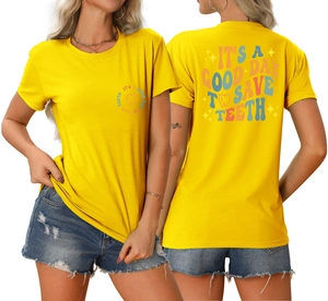 Close-up of It's a Good Day to Save Teeth slogan print on bright yellow cotton T-shirt