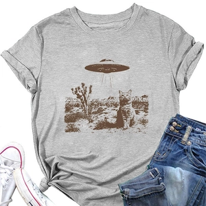 Detail of grey crewneck t-shirt featuring a vintage retro cat and UFO desert print