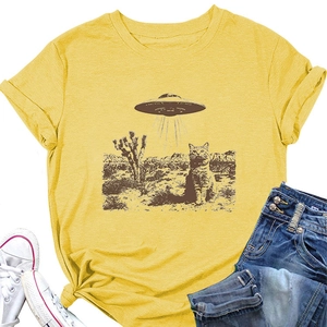 Detail of yellow cotton T-shirt featuring a cat UFO graphic with a side knot accent