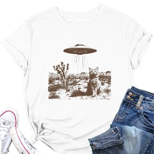 Flat lay of white cotton T-shirt featuring retro UFO and cat graphic with denim shorts