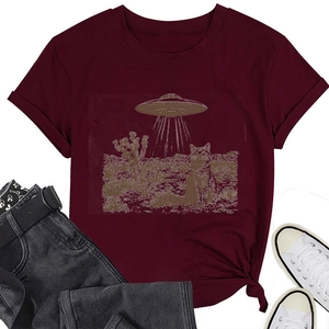 Flat lay of burgundy cotton T-shirt with cat UFO print, jeans and sneakers