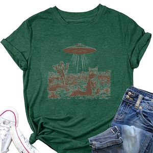 Detail of dark green t-shirt with UFO cat print, cotton fabric texture and crew neck