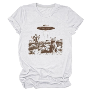 Close-up of retro UFO and cat graphic on white cotton crew neck T-shirt with rolled sleeves