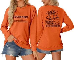 Detailed front and back views of an orange crewneck sweatshirt with black booktrovert print