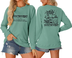 Front and back detail of mint green sweatshirt with Booktrovert print and floral graphics