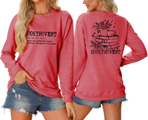 Red sweatshirt detail featuring back floral book graphics and front booktrovert text