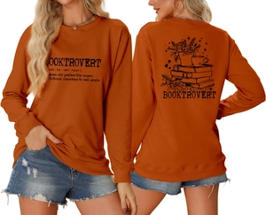 Detailed front and back view of orange Booktrovert sweatshirt with graphic print and text