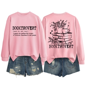 Front and back view of pink long sleeve Booktrovert sweatshirt with floral book graphic
