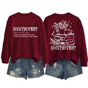 Detail of the Booktrovert crewneck sweatshirt featuring white typography and floral back print