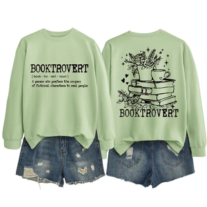 Detailed front and back view of Booktrovert mint green long sleeve sweatshirt with graphics