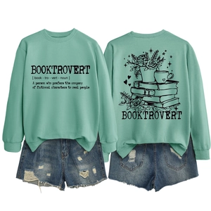 Detail of mint green Booktrovert sweatshirt with book and floral line art illustration