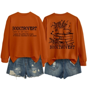 Front and back detail of orange Booktrovert sweatshirt with blue distressed denim shorts