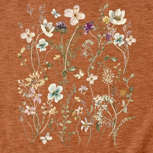 Detailed macro view of elegant floral print and butterfly on rust red knit fabric
