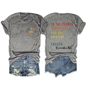 Front and back view of grey cotton T-shirt with inspirational graphic and denim shorts