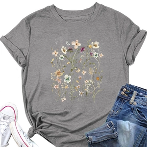 Detail of grey short sleeve T-shirt with floral print and a stylish knot hem detail