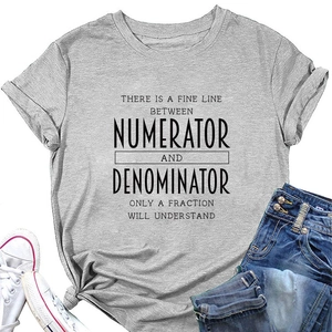 Flat lay of gray T-shirt with quote paired with denim jeans and white canvas shoes