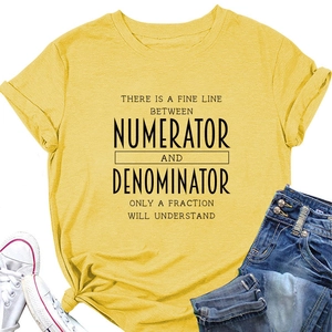 Flat lay of yellow t-shirt with math slogan paired with jeans and sneakers