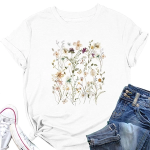 Flat lay of white crew neck T-shirt featuring elegant watercolor floral and butterfly prints