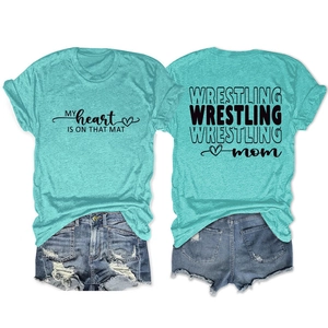 Detail of mint green Wrestling Mom t-shirt and frayed denim shorts set back and front view