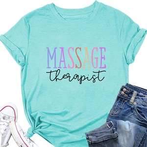 Flat lay of mint green massage therapist t-shirt with summer casual denim shorts