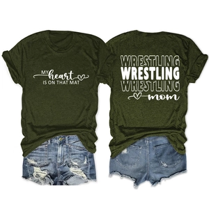 Detail of olive green Wrestling Mom T-shirt with heart print and soft cotton texture