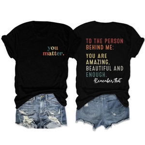 Flat lay of black cotton T-shirt front with You Matter print and back inspirational text