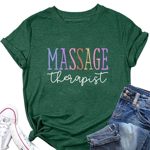 Detail of dark green Massage Therapist T-shirt paired with denim and white sneakers