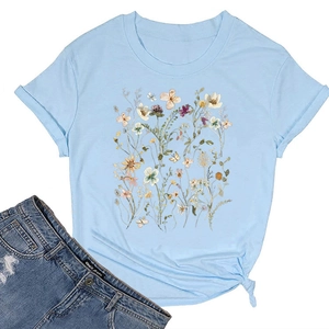 Detail view of light blue t-shirt with floral print and stylish side knot design