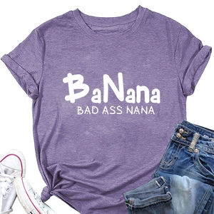 Detail of heather purple t-shirt with BaNana print paired with jeans and sneakers