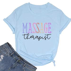 Detail of light blue cotton T-shirt featuring artistic Massage Therapist lettering on chest