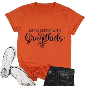 Close-up of orange cotton t-shirt featuring Life is Better With Grandkids print