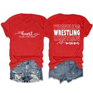 Detail of red Wrestling Mom T-shirt showing front and back white graphic print design
