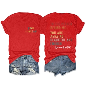 Detailed front and back view of red cotton T-shirt with inspirational text and denim shorts