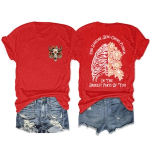 Detail of red floral rib cage skeleton print on back of casual short sleeve cotton T-shirt