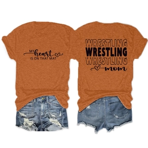 Detail of Wrestling Mom t-shirt showing front and back prints with denim shorts