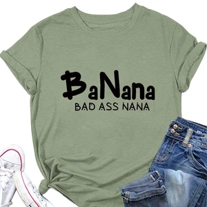 Detail of light green cotton T-shirt with BaNana Bad Ass Nana print and side knot