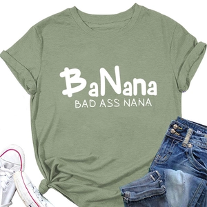 Detail of sage green BaNana T-shirt with rolled sleeves and a knotted hem design
