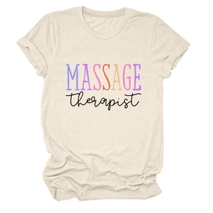 Detailed view of massage therapist text design on cream cotton short sleeve t-shirt