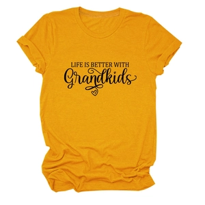 Close-up of yellow cotton t-shirt with black Life is Better with Grandkids slogan