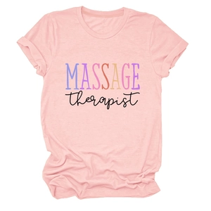 Detailed view of pink cotton T-shirt featuring artistic Massage Therapist lettering print