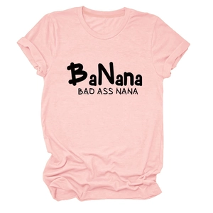 Close-up of pink crew neck t-shirt with black BaNana Bad Ass Nana slogan print