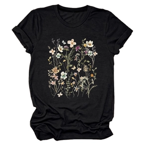 Detail of elegant black floral t-shirt with wildflower and butterfly print on soft cotton