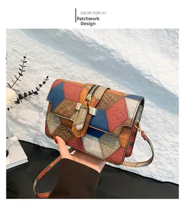 Detail shot of multi-color patchwork crossbody bag with textured leather and gold hardware