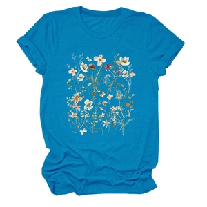 Detailed view of peacock blue floral print T-shirt with vibrant wildflower graphics