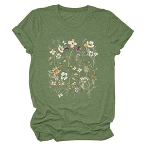 Detail of green floral T-shirt with wildflowers and butterfly print on soft fabric